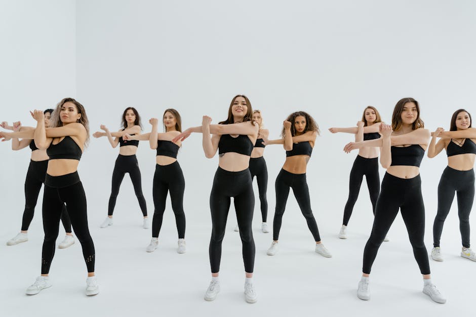 Group of people practicing yoga in a studio